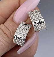 Серебряные серьги Cartier с золотыми пластинами