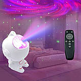 Нічник Астронавт дитячий лазерний проектор зоряного неба світильник Космонавт із Bluetooth колонкою та пультом, фото 8
