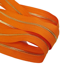 Блискавка рулонна металева двостороння №5 памаранчевий золото