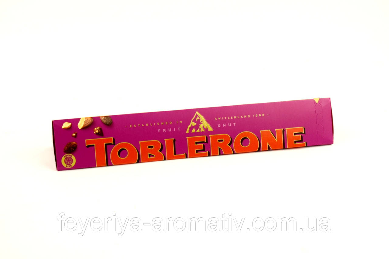Молочний шоколад із родзинками та горіхами Toblerone 100g (Швейцарія)