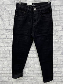 Чоловічі котонові джинси-мом на байці звужені в чорному кольорі