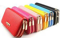 Гаманці та портмоне зі шкірзаму