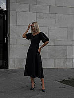 Черное женское сдержанное приталенное платье из костюмки длины миди с рукавами фонариками до локтя