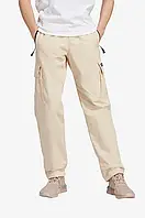 Urbanshop Бавовняні штани adidas Originals Adventure NA Pants колір бежевий прямі HR3506-cream РОЗМІРИ