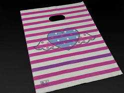Подарункові поліетиленові пакети 25х35см Полоса. Колір розовий. / Подарункові поліетиленові пакети 25х35см Полоса. Колір розовий.