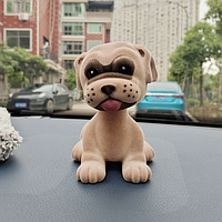 Собачка з ковальною головою на панель авто іграшка коричневого кольору на пружині 6.9*8.9*10CM