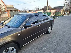 Дефлектори вікон (вітровики) Kia Magentis 2006-2010 (Autoclover A092)