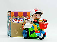 Игрушка Shantou Музыкальный велосипед "Stunt tricycle" с мальчиком 3115-1