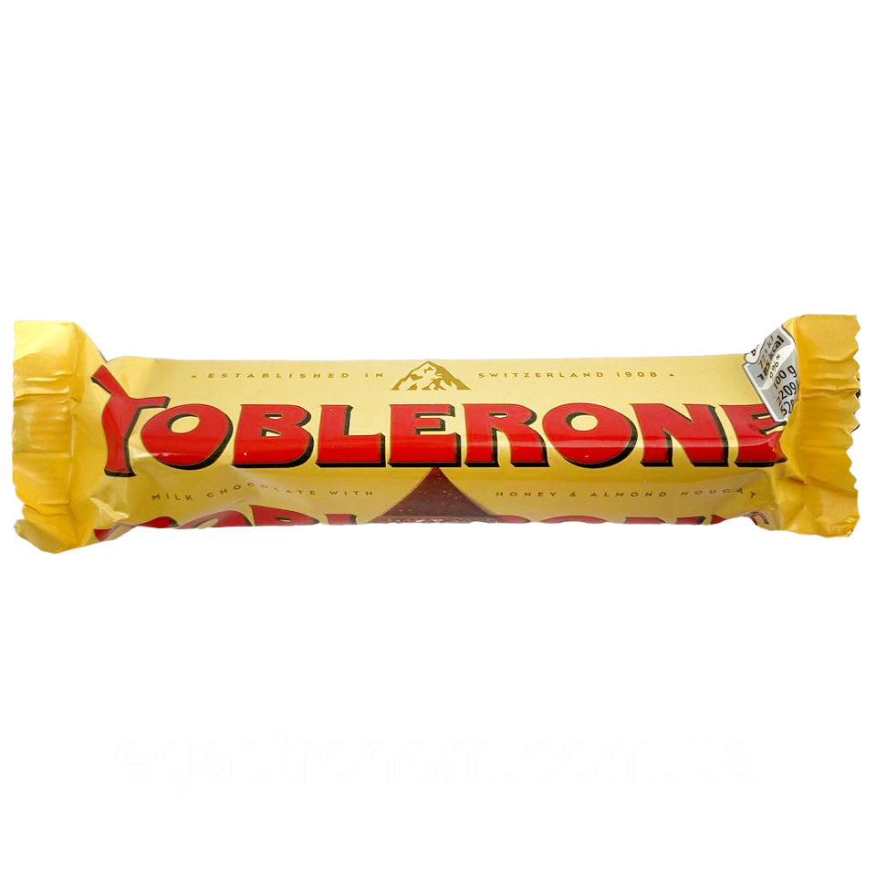 Шоколад молочний з медом та мигдальною нугою Тоблероне Toblerone 35g 24шт/пач (Код: 00-00015605)