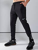 Спортивные штаны Nike мужские зауженные к низу, черные спорт штаны Найк узкие без резинки fms