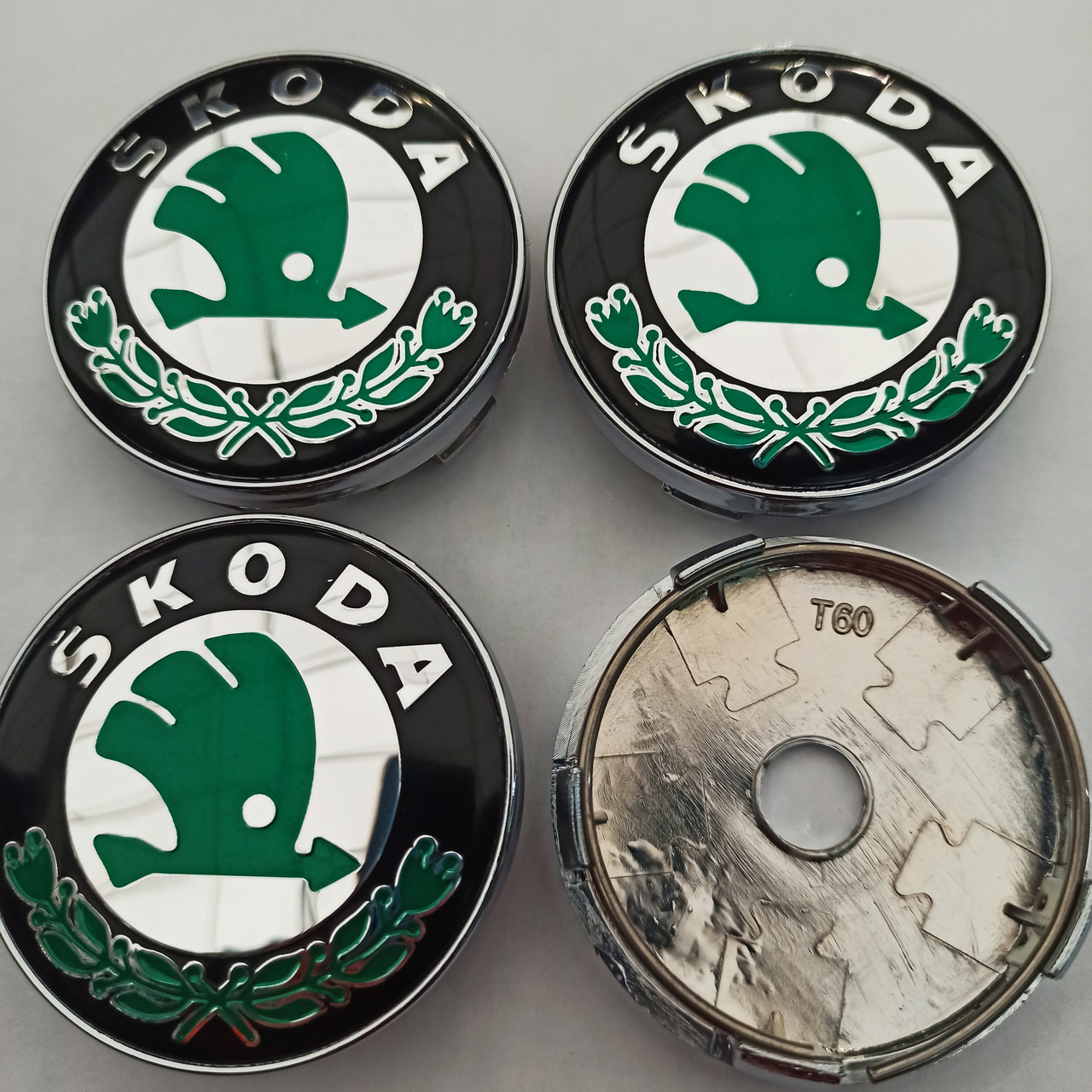Ковпачки в диски Skoda 56*60 мм