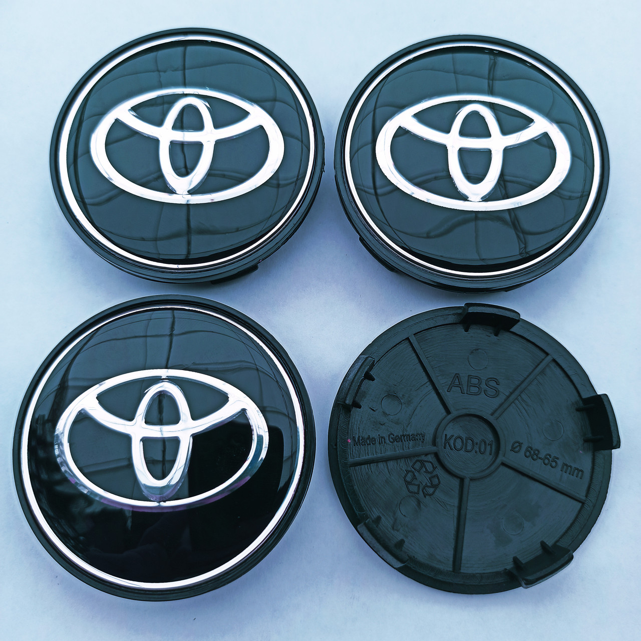 Ковпачки в диски Toyota 65*68 мм чорні