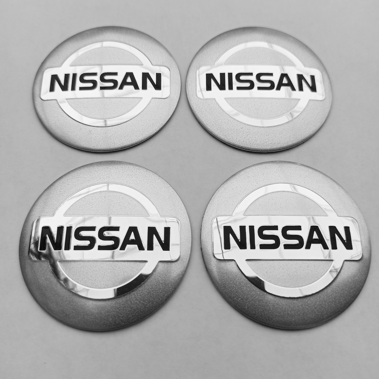 Наклейка опукла на ковпачок диска Nissan 56 мм