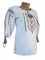 Красивая женская вышиванка с геометрическим орнаментом в белом цвете ткани «Мадонна» Коричневий орнамент