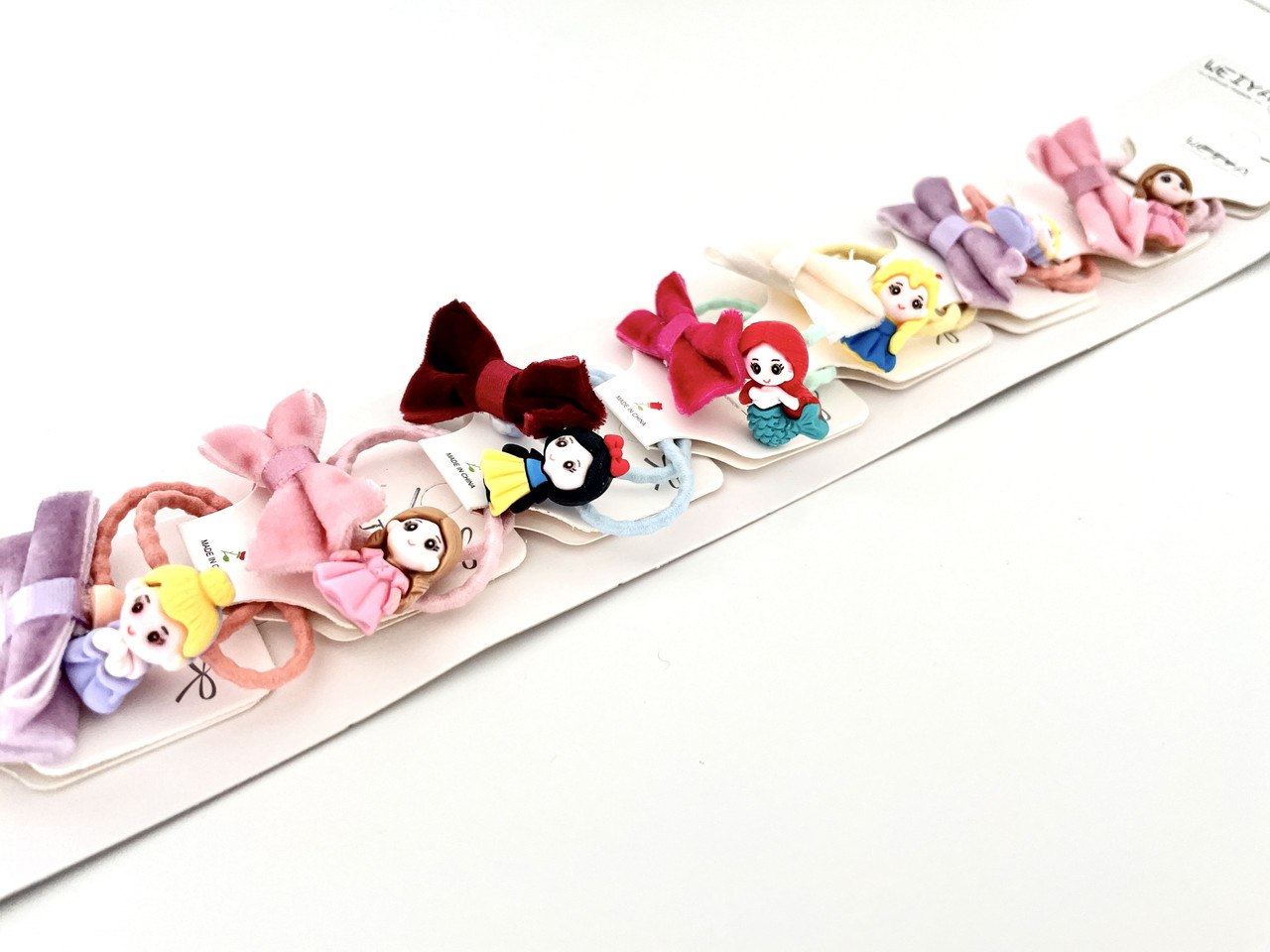 Дитячі резинки для волосся з принцесами-1, ЦІНА ЗА УП. 20ШТ, на планш. 47*9см (12 шт.), фото 1