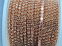 Стразовая цепочка ss6(2 мм), цвет страз шампань оправа розовое золото, цена за 1 метр.
