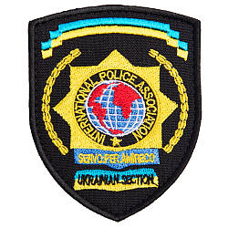 Шеврон нашивка на липучці International Police Association 7х9 см 800029586