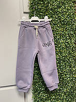 Спортивные штаны для девочки на флисе, лилового цвета, пояс на резинке, внизу на манжетах