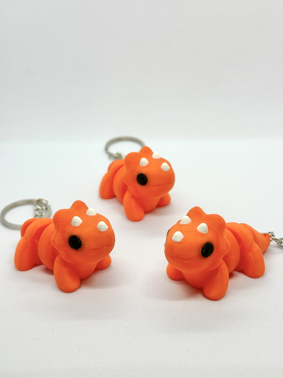 Брелок Динозавр Трицератопс надруковано на 3д принтері, фото 1