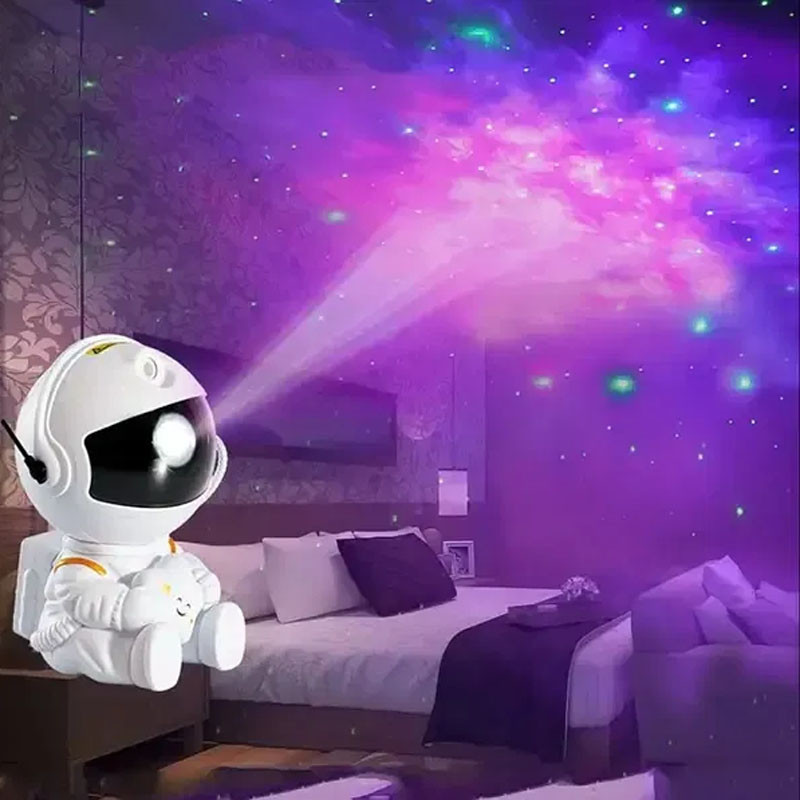 Дитячий нічник проєктор космонавт зоряне небо, астронавт галактичний лазерний проєктор для дітей у дитячу