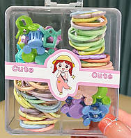 Набір дитячих резинок і затискачів-крабиків для волосся