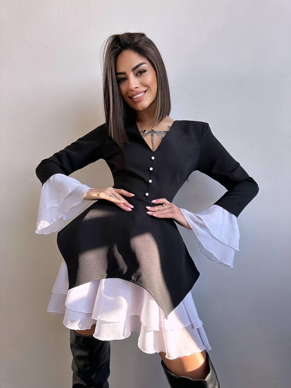 Стильна жіноча міні сукня з воланами на спідниці та рукавах Smb8903