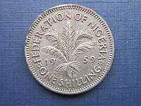 Монета 1 шиллинг Нигерия Британская 1959