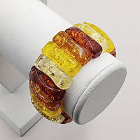 Браслет із синтетичного бурштину 28 мм 17 см на гумці колір комбінований