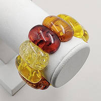 Браслет із синтетичного бурштину 32 мм 17 см на гумці колір комбінований