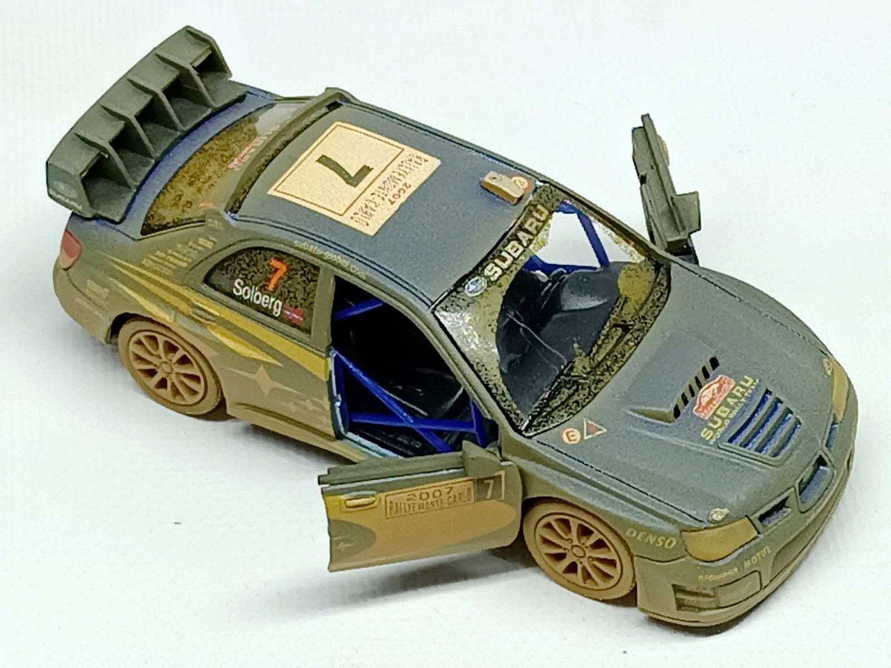 Машинка Kinsmart "Subaru Impreza 2007" синя брудна KT5328WY