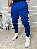 Синие спортивные утепленные штаны.12-180 хорошее качество