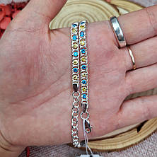 Жіночий патріотичний срібний браслет 925° проби "Арабський Бісмарк" з жовто-блакитним камінням., фото 2