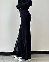 Женские вязаные штані черного цвета в рубчик с высокой посадкой