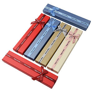 Коробочка прямокутна картонна однотонна з бантом під браслет розмір 21Х45Х23 мм 12 штук в пакованні мікс