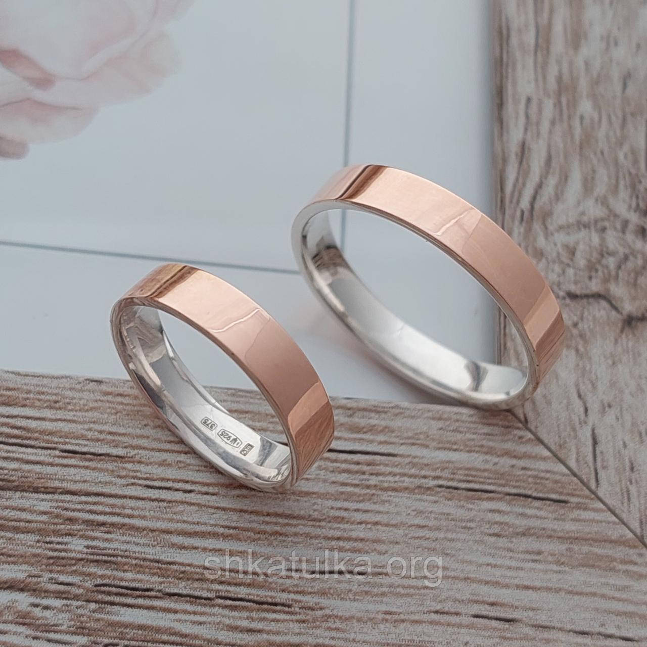 Обручки срібні з золотими напайками гладкі пара