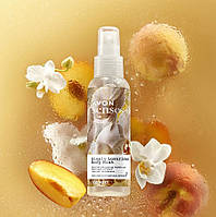 Освіжаючий лосьйон-спрей для тіла «Справжня розкіш» Avon з ароматом персика та ванільної орхідеї, 100 мл