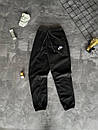 Спортивні штани чоловічі чорні однотонні зимові на флісі фірмові Nike (Найк), фото 2