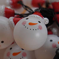 Гирлянда светодиодная Снеговик в шапочке 12 LED DL 5 метров теплый белый