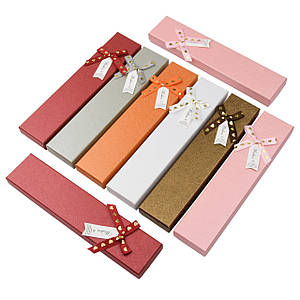 Коробочка прямокутна картонна однотонна з бантом під браслет розмір 21Х45Х23 мм 12 штук в пакованні мікс