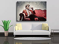 Картина на холсте "Молодой человек на диване с бокалом вина Ретро" 75х50