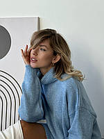 Женский зимний удлиненный свитер из шерсти
