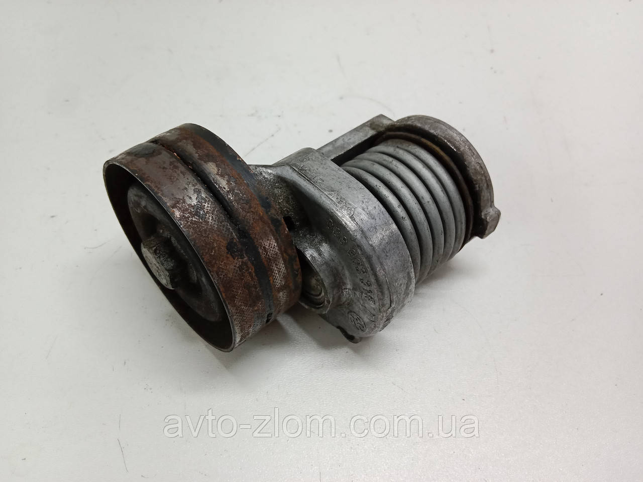 Натягувач ременя генератора Volkswagen Touran, Passat B6, Caddy. 1.9 – 2.0TDI. 038903315T.