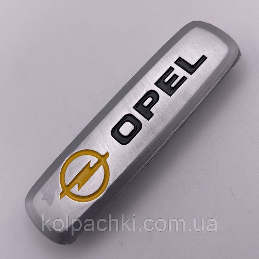 Шильдик на автокилимок-опель Opel