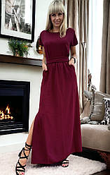 Довга сукня в бордовому кольорі із тканини креп-жатка з розрізами по низу. Розміри від 44 до 58
