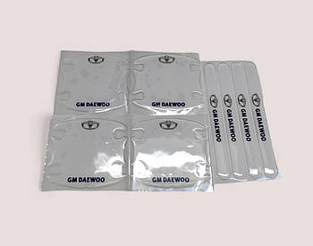 Наклейки захисні прозорі на дверні ручки + під дверні ручки з маркою авто Daewoo , захист від подряпин
