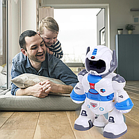 Інтерактивна дитяча іграшка танцюючий робот музичний зі світловими ефектами на батарейках біло-синій