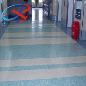 Укладання комерційного лінолеуму з дизайном