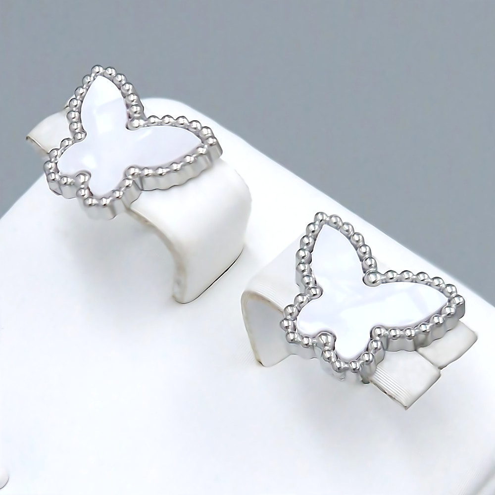 Сережки-гвоздики Stainless Steel з емаллю. Сталь. Родій. Довжина: 11 мм. Ширина: 13 мм.