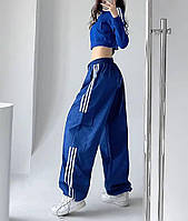 Женские спортивные широкие штаны-карго синего цвета с белыми лампасами в одном размере 42/46 из плащевки