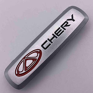 Шильдик на автокилимок чері Chery